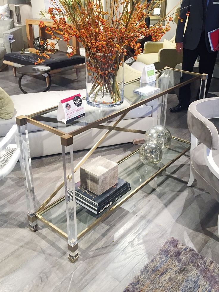 brass and plexi console table